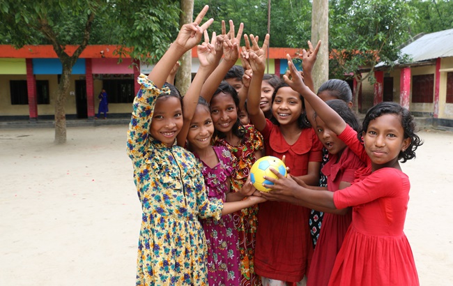 Girls from Nilphamari district in Bangladesh play football together
