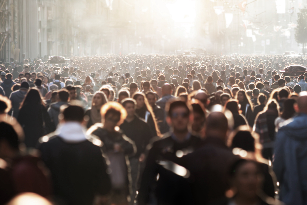 Blurred crowd of unrecognizable at the street